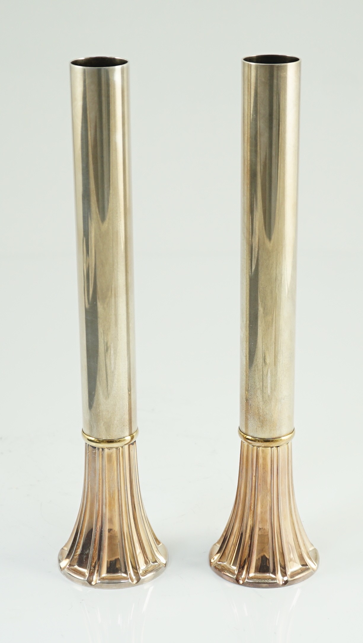 A modern pair of French parcel gilt 925 silver cylindrical flower holders, by Tabbah, Paris